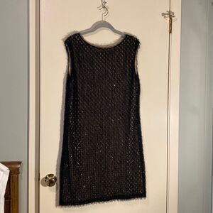 Badgley Mischka black sleeveless dress. Dressy, knee length, Lacey, nude lining.